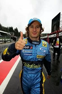 Images Dated 28th August 2004: Formula One World Championship: Jarno Trulli Renault celebrates pole position