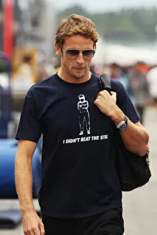 Images Dated 25th July 2010: Formula One World Championship: Jenson Button McLaren wearing a I didn t beat the stig T-shirt