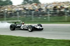 1969 Collection: Formula One World Championship: Jo Siffert Rob Walker Racing Lotus 49B retired on lap 66 with a