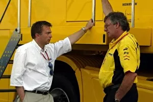 Images Dated 27th June 2003: Formula One World Championship: Jost Capito Director of Ford Team RS chats with Gary Anderson