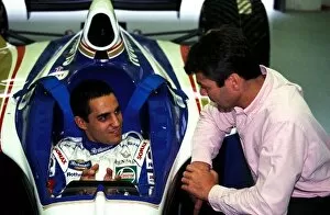 Images Dated 24th April 2003: Formula One World Championship: Juan Pablo Montoya sits in a Williams Renault FW19 chatting to
