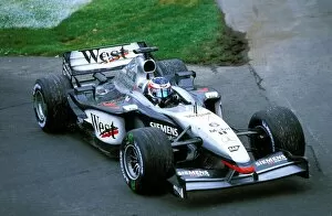 Images Dated 16th June 2003: Formula One World Championship: Kimi Raikkonen McLaren Mercedes MP4 / 17D recovers to a safe