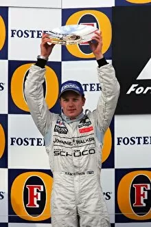 Images Dated 2nd April 2006: Formula One World Championship: Kimi Raikkonen McLaren celebrates on the podium