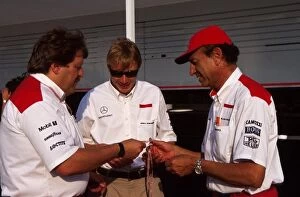Images Dated 26th September 2001: Formula One World Championship: L-R: Norbert Haug Mercedes Motorsport Boss, Mika Hakkinen