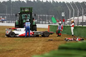 Images Dated 23rd July 2010: Formula One World Championship: Lewis Hamilton McLaren MP4 / 25 after he crashed out in the first