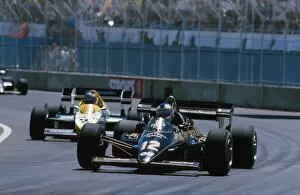 1984 Collection: Formula One World Championship: The Lotus of Nigel Mansell leads the Williams of race winner Keke