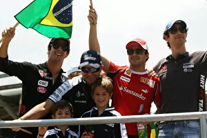 Brasilian Collection: Formula One World Championship: Lucas di Grassi Virgin Racing with Rubens Barrichello Williams