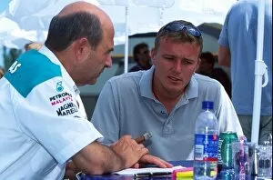 Images Dated 12th June 2001: Formula One World Championship: Marcel Fassler chats to Peter Sauber about the promised F1 test