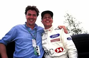Australia Collection: Formula One World Championship: Mark Stewart with Johnny Herbert stewart Grand Prix