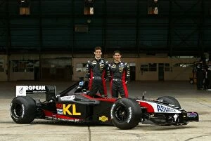 Images Dated 25th February 2002: Formula One World Championship: Mark Webber, left, and team mate Alex Yoong KL Minardi Asiatech