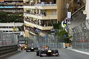 Best Images Collection: Formula One World Championship: Mark Webber Red Bull Racing RB6 leads at the start of the race