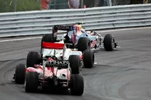 Formula One World Championship: Mark Webber Red Bull Racing RB6 leads Lewis Hamilton McLaren MP4 / 25