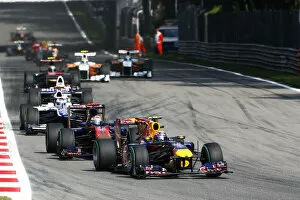 Formula One World Championship: Mark Webber Red Bull Racing RB6 on the opening lap of the race