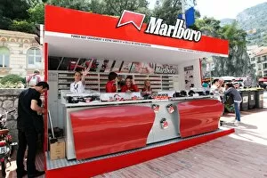 Formula One World Championship: Marlboro cigarette stand featuring images of Ferrari cars