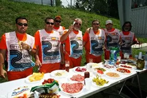 Formula One World Championship: Marshals enjoy a pre race lunch