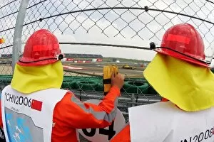 Images Dated 24th September 2004: Formula One World Championship: Marshals by the trackside