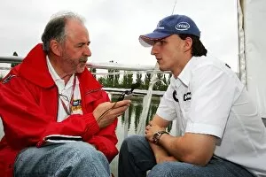 Images Dated 22nd June 2006: Formula One World Championship: Maurice Hamilton BBC Radio 5 Live Presenter interviews Robert