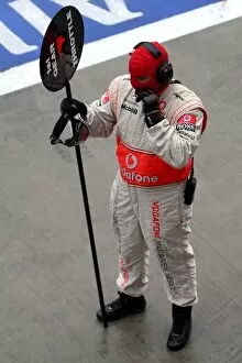 Fuji International Speedway Gallery: Formula One World Championship: McLaren lollipop man