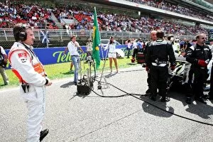 Formula One World Championship: McLaren take a look at the Brawn Grand Prix BGP 001 on the grid