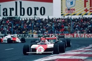 1983 Gallery: Formula One World Championship: The McLaren of Niki Lauda leads the Lotus of Elio de Angelis