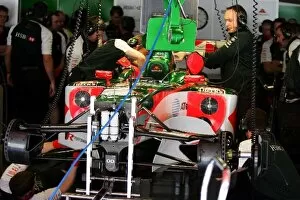 Images Dated 7th May 2004: Formula One World Championship: Mechanics work on the Jaguar R5 in the pits