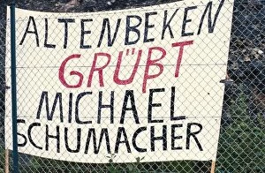 Belgium Collection: Formula One World Championship: Michael Schumacher gets a message from the fans