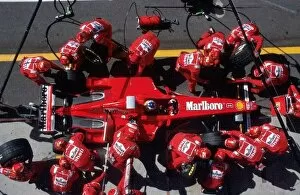 Images Dated 25th June 2008: Formula One World Championship: Michael Schumacher Ferrari F300 makes a pit stop