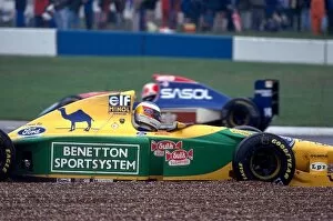 Great Britain Collection: Formula One World Championship: Michael Schumacher Benetton Ford B193B spins out of the race