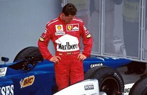 Formula One World Championship: Michael Schumacher, Ferrari F310B 5th place spent 10 minutes looking at the McLaren