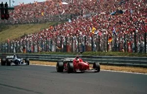 Images Dated 26th July 2005: Formula One World Championship: Michael Schumacher Ferrari F310 gets pole position in front of