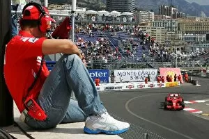2008 Collection: Formula One World Championship: Michael Schumacher Ferrari watches Kimi Raikkonen Ferrari F2008