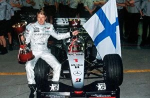 Images Dated 17th December 2003: Formula One World Championship: Mika Hakkinen Mclaren MP4-14 race winner