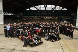 Team Mate Collection: Formula One World Championship: The Minardi Team gather for a team portrait on their arrival in
