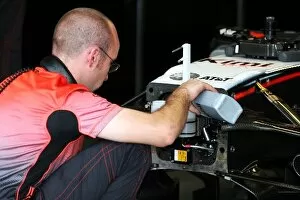 Images Dated 8th October 2005: Formula One World Championship: Mobil brake fluid is added to the McLaren Mercedes MP4 / 20