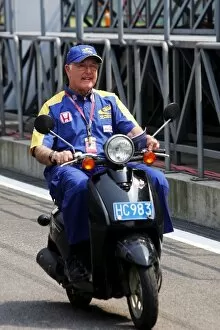 Images Dated 28th September 2006: Formula One World Championship: Murray Walker on a moped