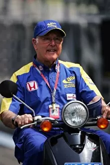 Images Dated 28th September 2006: Formula One World Championship: Murray Walker on a scooter