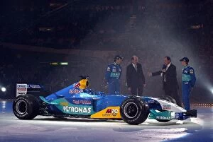 Images Dated 10th February 2003: Formula One World Championship: The new Sauber C22 is paraded on an ice rink with key dignitaries