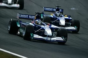 Team Mate Collection: Formula One World Championship: Nick Heidfeld Sauber Petronas C20 leads team-mate Kimi Raikkonen