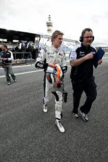 Formula One World Championship: Nico Hulkenberg Williams with Tom McCullough AT&T Williams Test Team Manager walks in