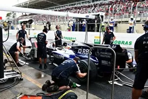 Brasilian Collection: Formula One World Championship: Nico Hulkenberg Williams FW32 changes onto slick tyres en route to