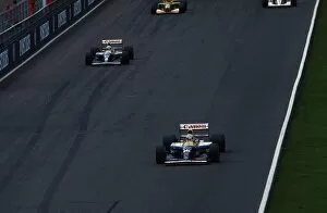 Britain Collection: Formula One World Championship: Nigel Mansell Williams Renault FW14B leads team mate Riccardo