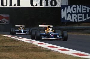 Italy Collection: Formula One World Championship: Nigel Mansell Williams FW14 leads team mate Riccardo Patrese