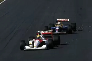 Images Dated 5th February 2001: Formula One World Championship: Nigel Mansell following Ayrton Senna closely at Suzuka