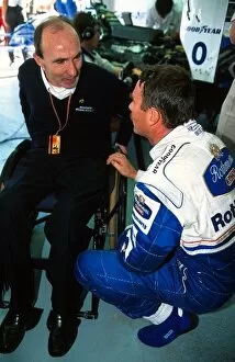Formula One World Championship: Nigel Mansell, right, explains his mid-race accident to Williams team boss Frank