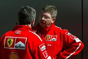 Images Dated 9th March 2003: Formula One World Championship: Nigel Stepney and Ross Brawn Ferrari Technical Director chat in