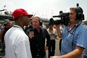 Images Dated 17th June 2007: Formula One World Championship: Pharrell Williams talks with Martin Brundle