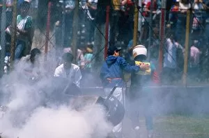 Images Dated 12th October 2005: Formula One World Championship: Philippe Alliot walks away from the wreckage of his Larrousse Lola