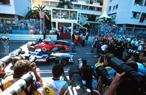 Photographer Collection: Formula One World Championship: The photographers focus their attentions to the winners podium
