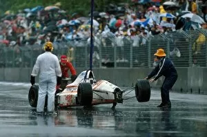 F1 Collection: Formula One World Championship: Piercarlo Ghinzanis Osella FA1-M89 is removed after a shunt with