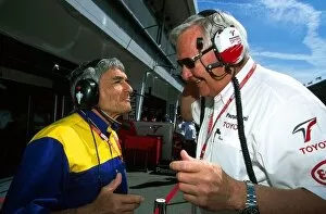 Images Dated 14th May 2002: Formula One World Championship: Pierre Dupasquier Michelin Competitions Director speaks with Ove